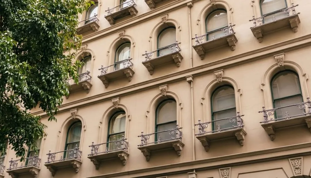 Clean heritage Victorian sandstone building facade after professional soft wash facade cleaning in Melbourne